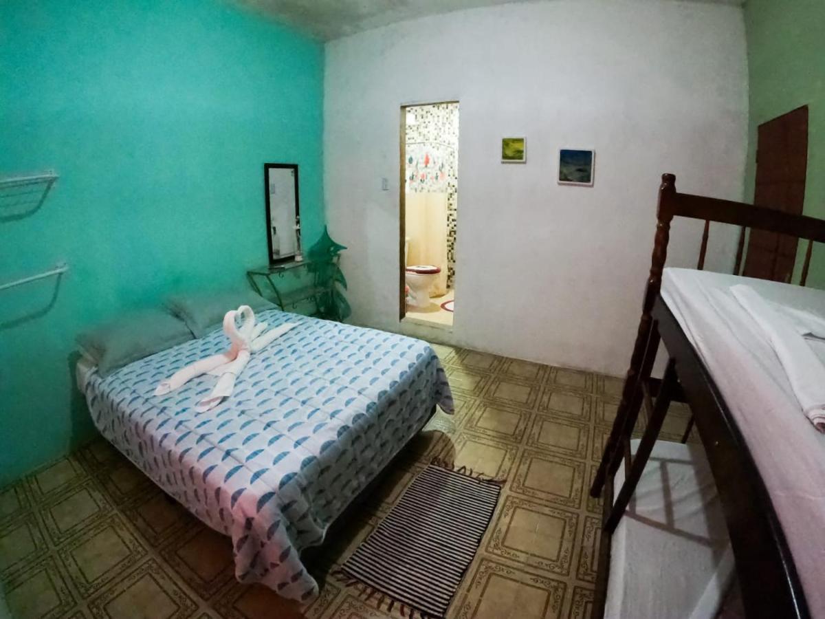 Casarao Hostel E Pousada Vila do Abraao Bagian luar foto